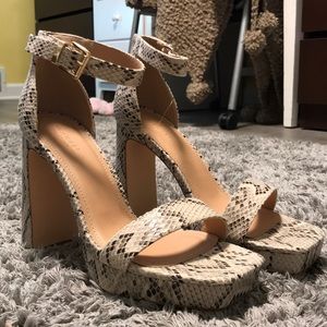 Bring 'Em to Heel Snakeskin Platform Heels